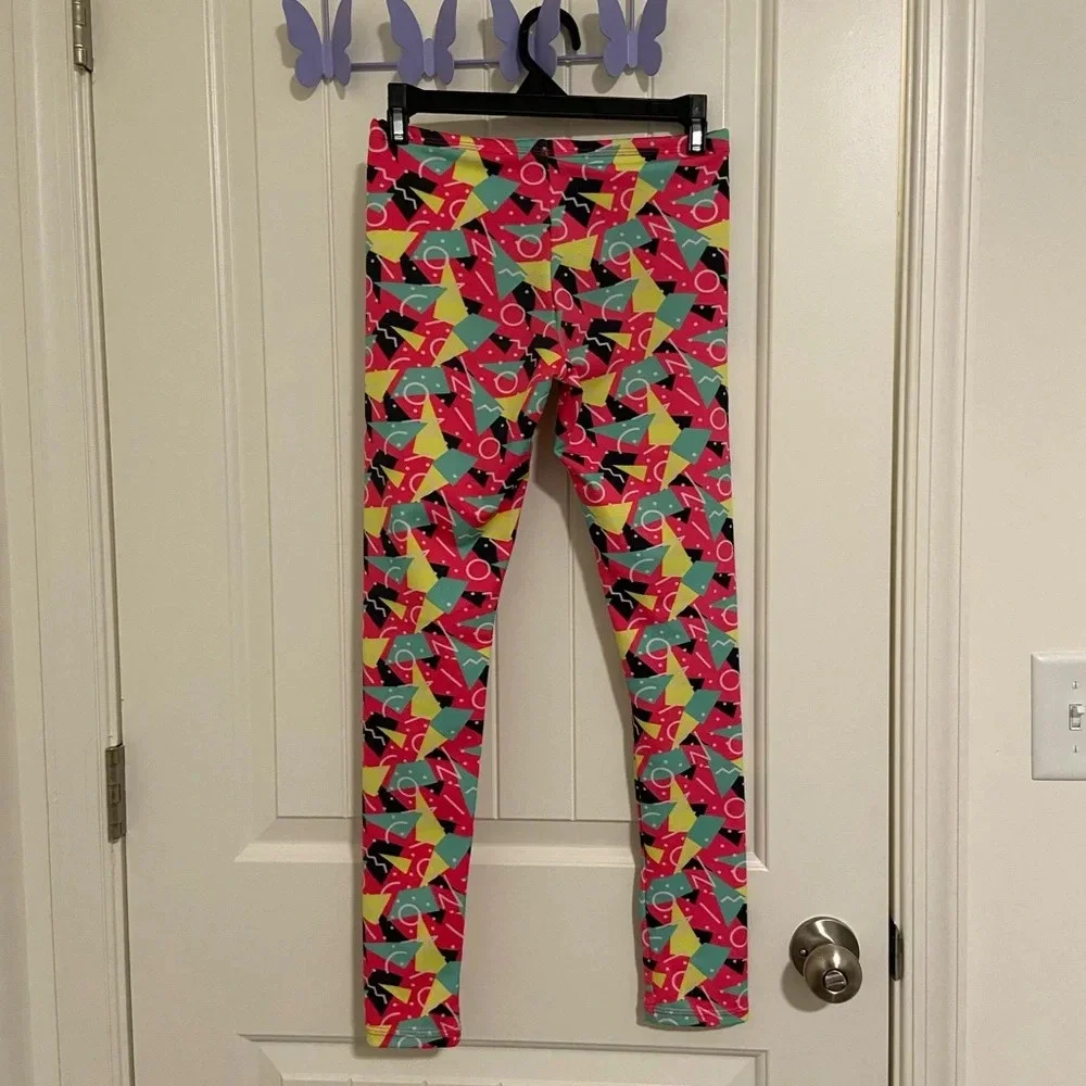 EUC | Dolfin girl’s Uglies patterned drag swim pants —‎ large